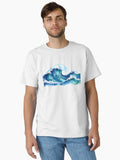 A dynamic watercolor painting captures powerful ocean waves crashing with vibrant blues and seafoam T Shirt