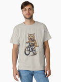 Cat Riding a Bicycle Men's T-Shirt Fun Kitten Wheelie Graphic Eco-Friendly Fashion Classic T-Shirt | Graphic T-Shirt for Unisex