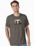 Two figures with vintage television heads wearing jackets stand in a foggy outdoor setting a surreal T Shirt